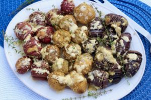 Red, White, & Blue Hasselback Potatoes in Gouda Cream Sauce