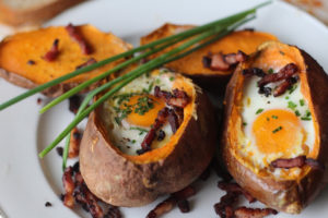 Breakfast Sweet Potatoes: Eggs Baked in Sweet Potatoes withCheese & Bacon
