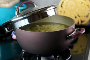 Pasta in Circulon strainer lid pot