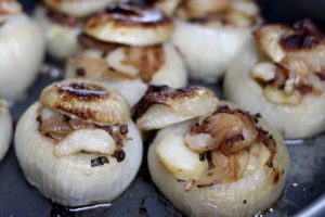 Fried potato stuffed onions