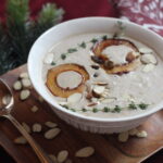 Creamy chestnut soup with festive garnish