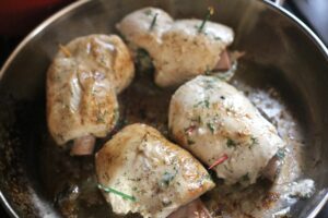 Chicken roulade in a pan