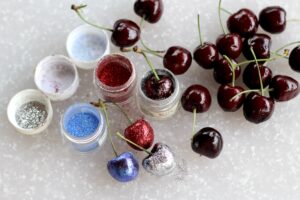 Adding glitter to cherries