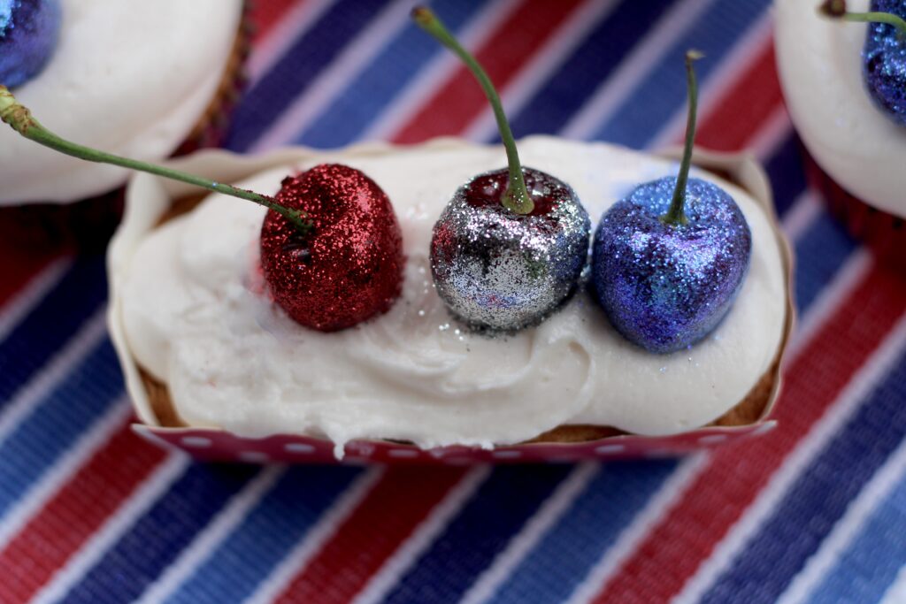 Glittery maraschino cherry cupcakes