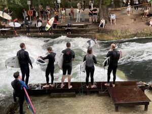 9 Notable Munich Mainstays: surfing on the Eisbach