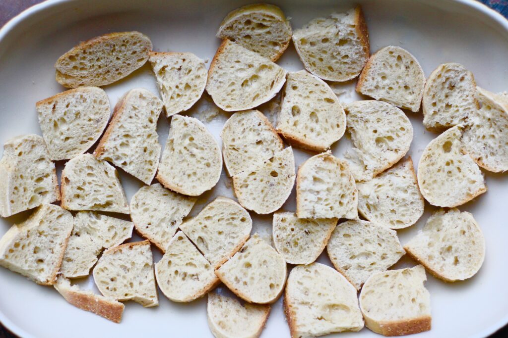 Sliced Baguette in a casserole dish