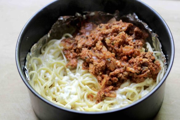 Spaghetti and sauce in a springform pan