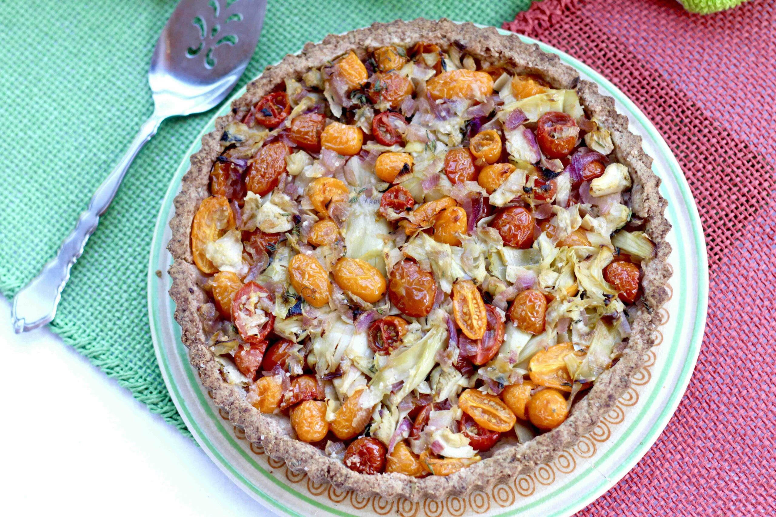 Cheese-crusted tomato Artichoke Tart