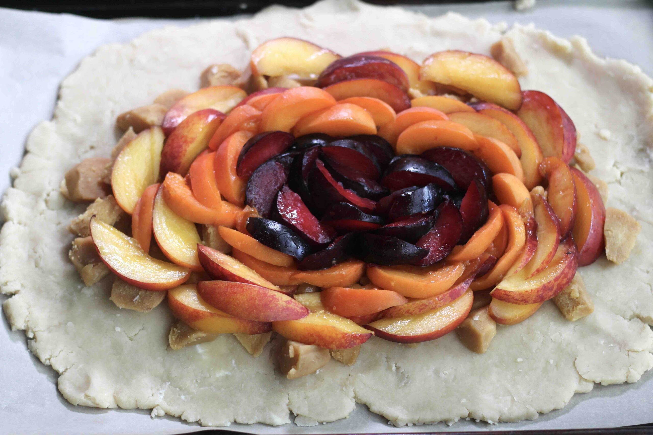 layering fruit in a tart