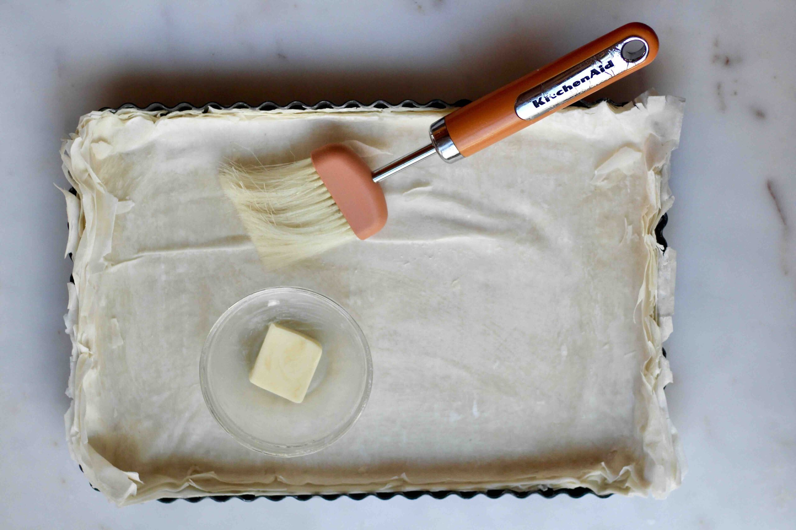 Brushing Filo Dough Sheets with Butter