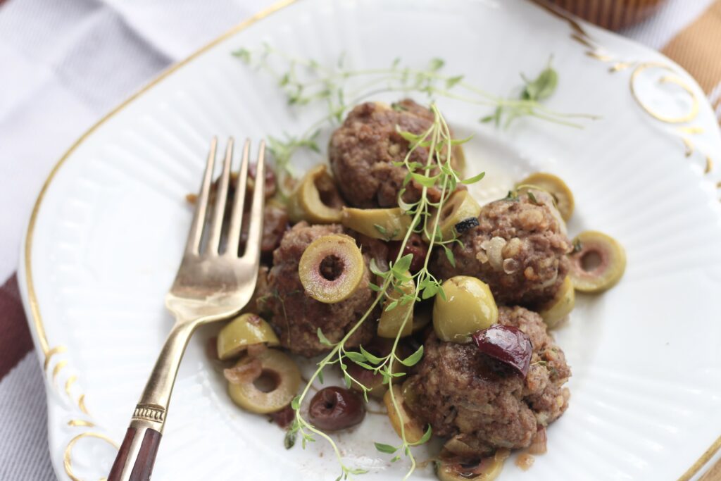 Cheesy Meatballs in Olive Sauce