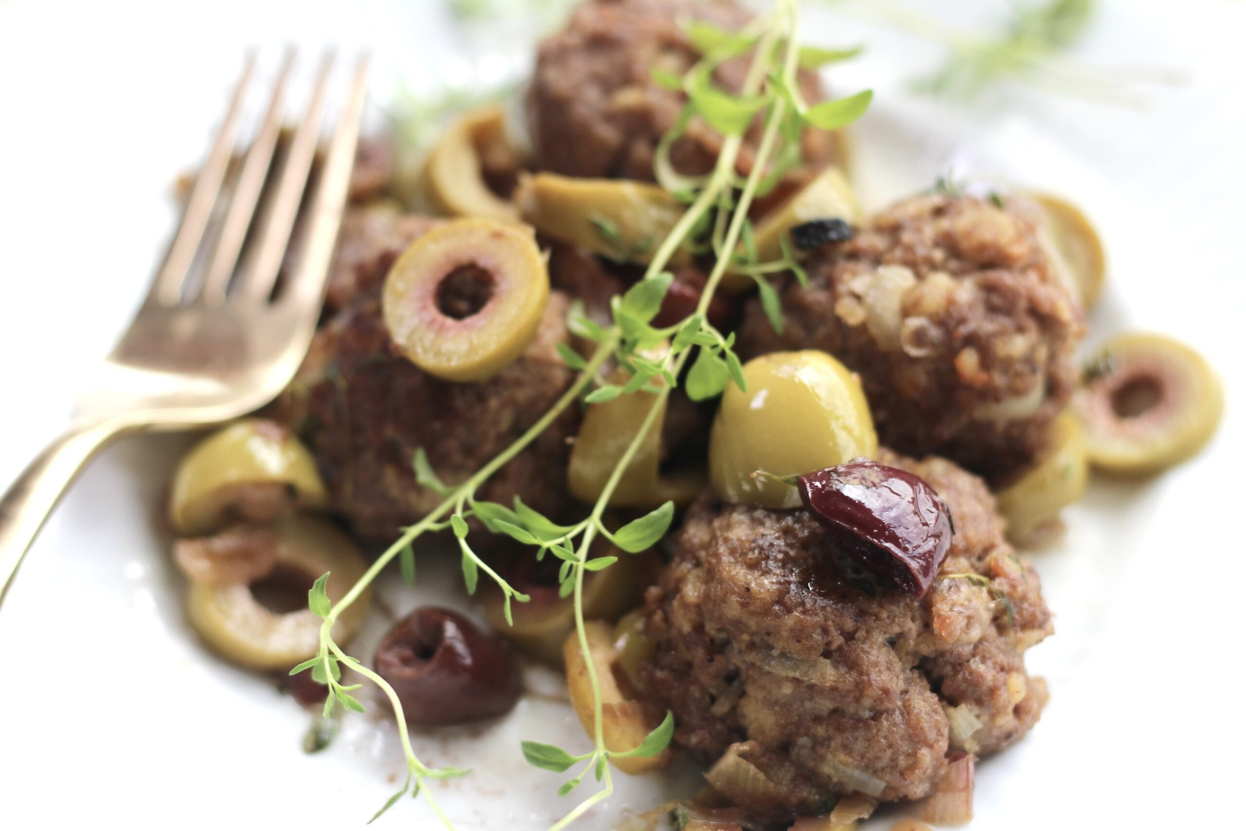 Cheesy Meatballs in Olive Sauce