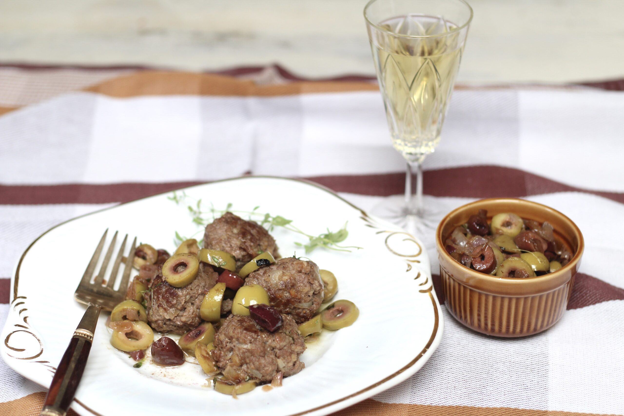  Cheesy Meatballs in Olive Sauce