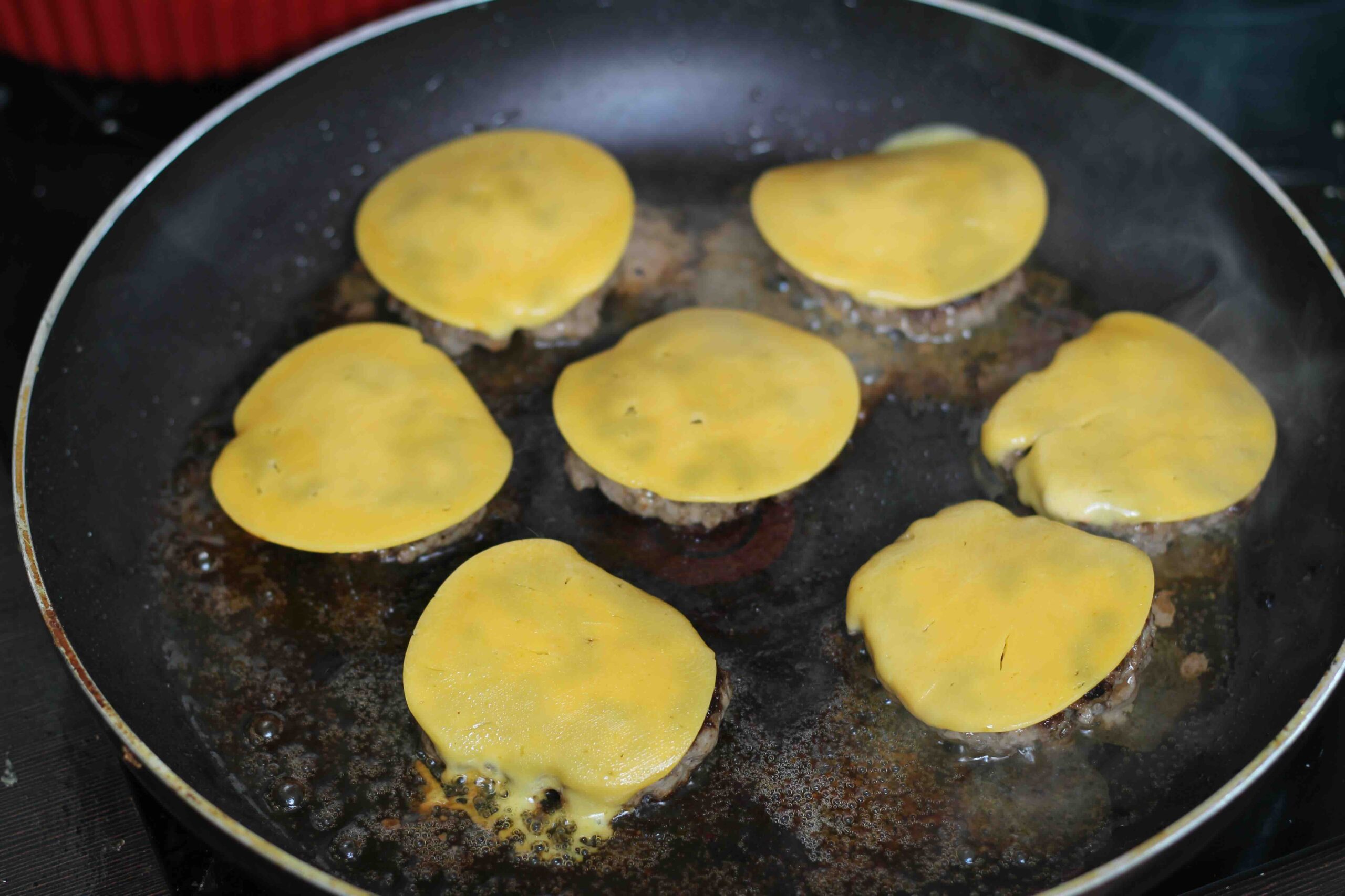 Frying-beef-cheeseburgder-sliders Frying cheeseburger sliders